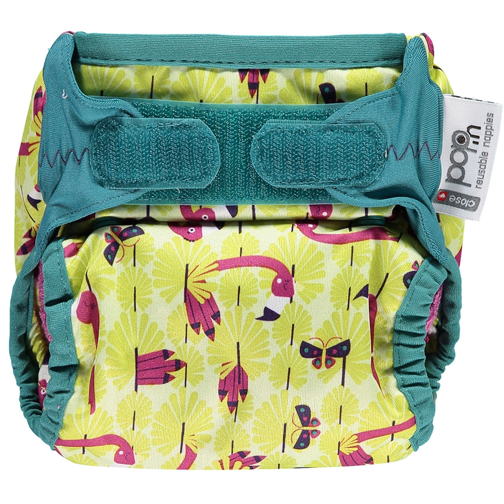 The Close Pop-In +bamboo reusable cloth nappy with adjustable velcro closures, in a flamingo print