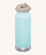 A blue Klean Kanteen 32oz TKWide insulated bottle with a twist straw cap.