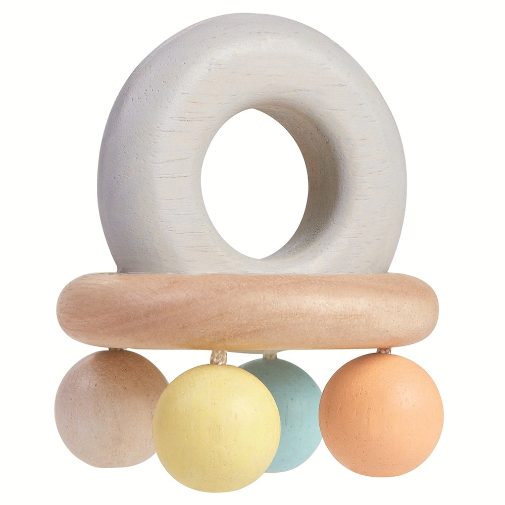 A side view of the PlanToys Pastel Bell Rattle on a plain background.