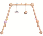 The PlanToys Pastel Play Gym on a plain background.