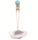 The planet hanging toy from the PlanToys Pastel Play Gym.