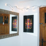 A Grimm's Large magnetic puzzle board on a wall with colourful art work