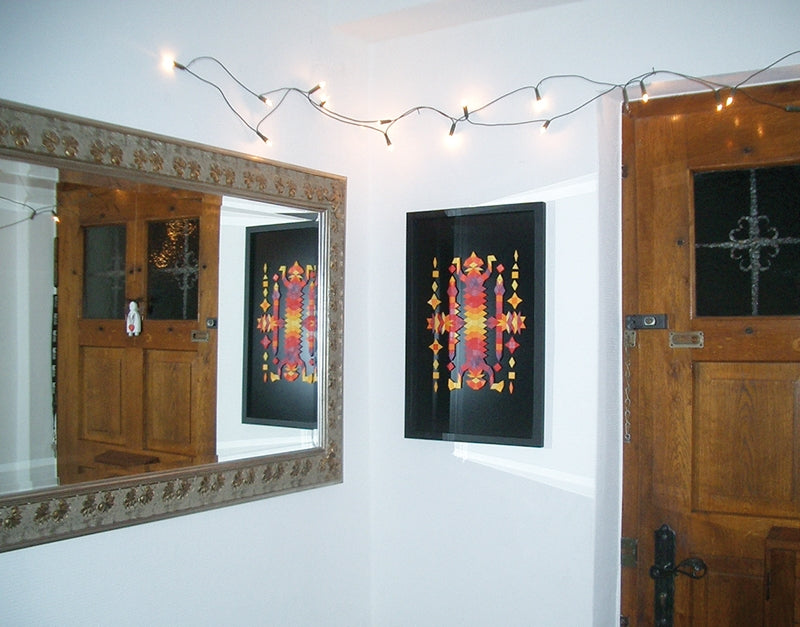 A Grimm's Large magnetic puzzle board on a wall with colourful art work