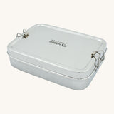 A slice of green large lunchbox with mini container available at Babipur. A stainless steel rectangular lunchbox with clips on each side for a secure lock