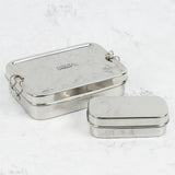 A slice of green large lunchbox with mini container available at Babipur.