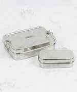 A slice of green large lunchbox with mini container available at Babipur.