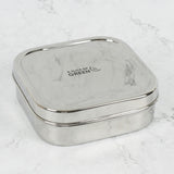A slice of green shimla large square container lunchbox standing on a stone surface available at Babipur.
