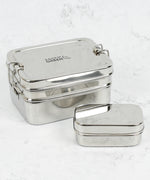 A slice of green two tier lunchbox with mini container available at Babipur.