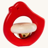 Bajo red bird rattle available at Babipur.  A wooden bird rattle with a bell in the middle.