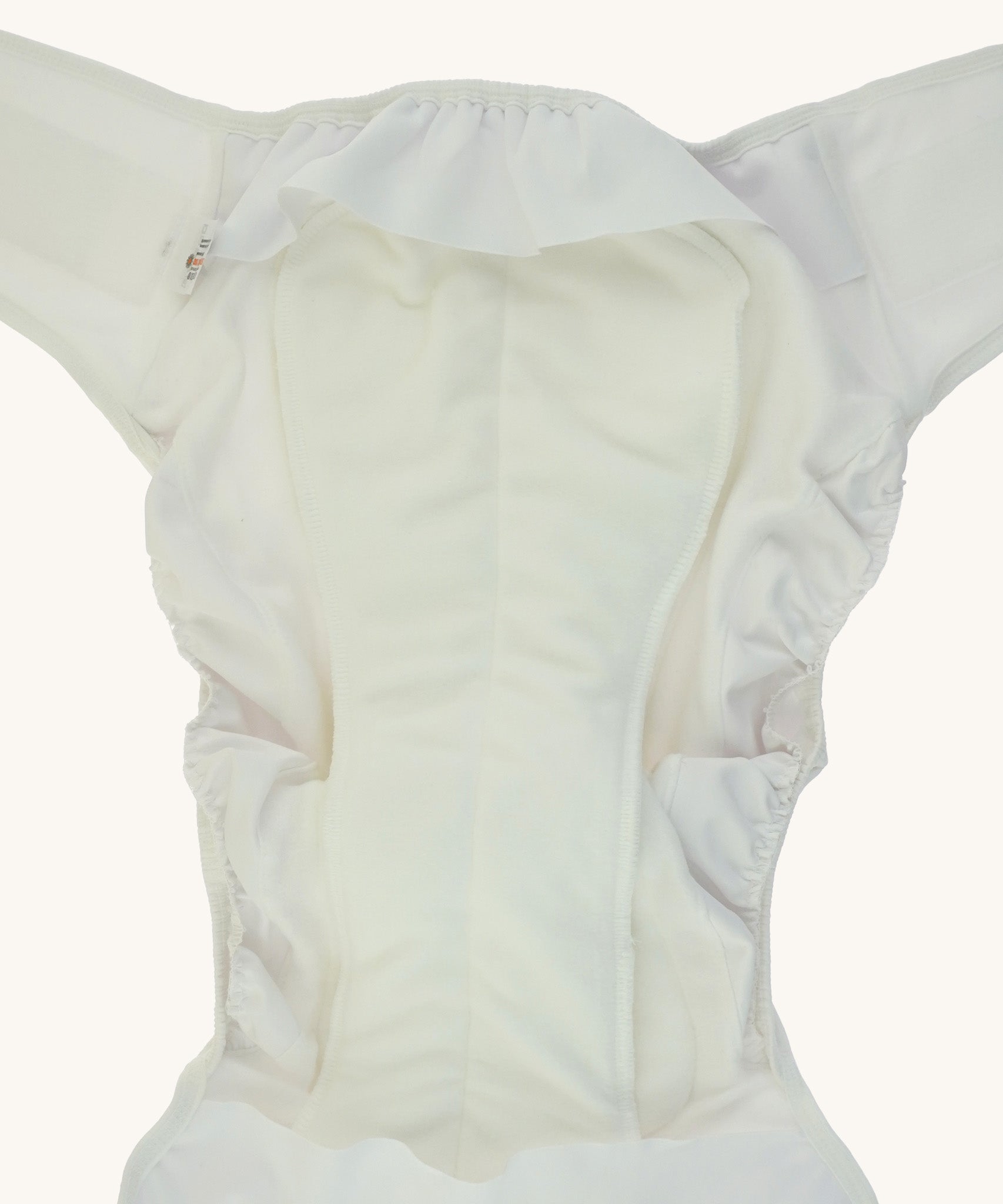 A close up of the Bambinex incontinence booster available at Babipur. Showing the soft incontinence boosters inside the Bambinex adult incontinence nappies for extra absorbency