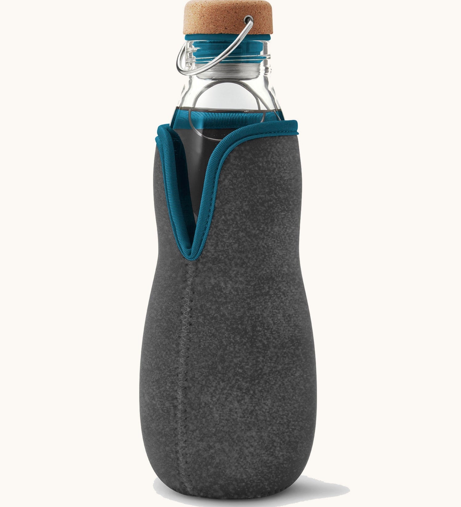 Black + Blum glass bottle with active charcoal water filter and locking coil available at Babipur. Features a felted holder with dark blue trim and a cork lid with a loop handle