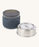 A close up of the Black + Blum leakproof microwave safe glass lunchbowl in slate showing the  leakproof silicone lid detail