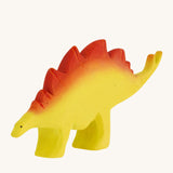 Bumbu big wooden stegosaurus dinosaur toy figure on a plain background.