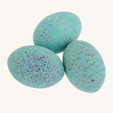 Bumbu Wooden Brontosaurus Dinosaur Eggs on a plain background.