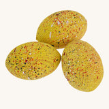 Bumbu stegosaurus egg set on a plain background.