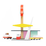 The side of the Candylab Rocket Fuel Station, with Candylab cars pulling into the petrol station