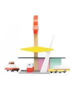 The side of the Candylab Rocket Fuel Station, with Candylab cars pulling into the petrol station