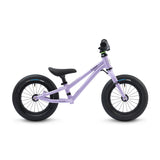 A side view of the Early Rider Charger Balance Bike - Violet Haze, showing the purple fame and the thickness of the black wheels