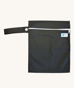 Earthwise medium wet bag in a black design available at Babipur. A black wetbag with a a white zip fastener and matching black hanging loop.