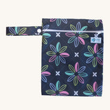 Earthwise medium wet bag in a charcoal flowers design available at Babipur. A dark grey wetbag with a elegant flowery design. Features a white zip fastener and matching flowery hanging loop.