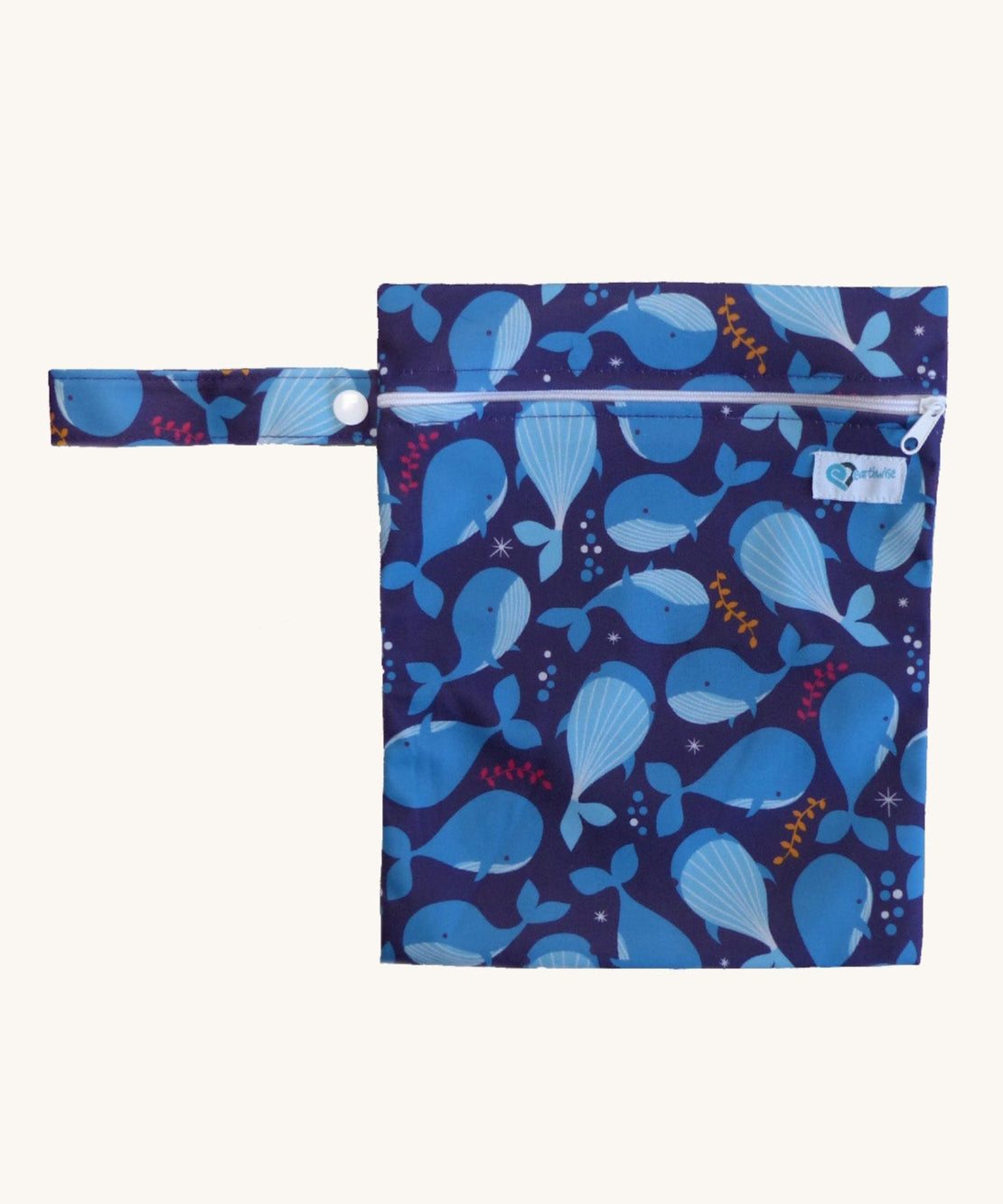 Earthwise medium wet bag in a whale design available at Babipur. A dark blue wetbag with a playful whale design. Features a white zip fastener and matching blue whale hanging loop.