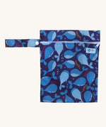 Earthwise medium wet bag in a whale design available at Babipur. A dark blue wetbag with a playful whale design. Features a white zip fastener and matching blue whale hanging loop.