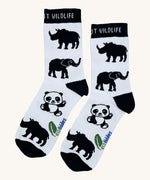 Eco kiddies wild about wildlife organic cotton kids socks available at Babipur. A white sock with black detail and a cute elephant, panda and rhino design in black.