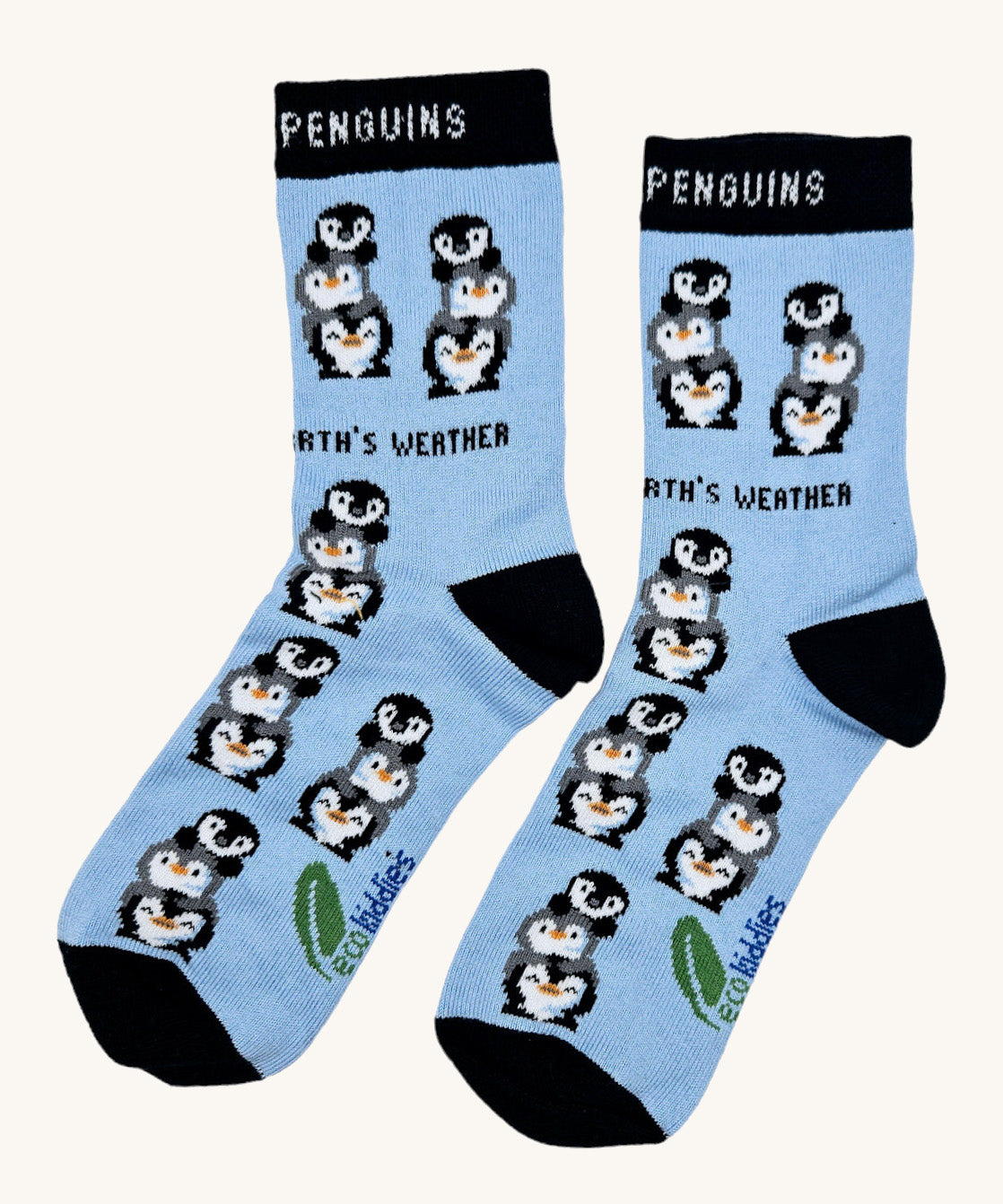 Eco kiddies friendly penguins organic cotton kids socks available at Babipur. A light blue sock with black detail. Features  a cute playful penguin design
