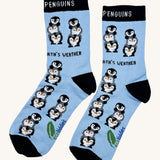 Eco kiddies friendly penguins organic cotton kids socks available at Babipur. A light blue sock with black detail. Features  a cute playful penguin design