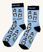 Eco kiddies friendly penguins organic cotton kids socks available at Babipur. A light blue sock with black detail. Features  a cute playful penguin design