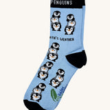 Eco kiddies friendly penguins organic cotton kids socks. A light blue sock with black heal and toe detail and matching cuff.