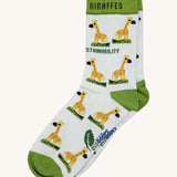 Eco kiddies organic cotton white giraffe sock with green detail and a cute giraffe design with branding on the sole