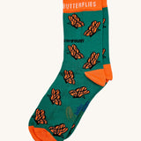 Eco kiddies organic cotton green butterfly sock with orange detail and a cute orange butterfly design with branding on the sole