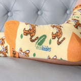 A close up of the Eco Kiddies organic cotton cheetah socks showing the cute cheetah design and the branding on the sole