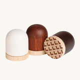 A closer look at the Erzi Toys marshmallows, showing the natural wood grain through the paint work.