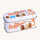 A closer look at the Marshmallow Trio tin on a cream background. A realistic Mini Dickmann's Schoko Trio tin in white, with chocolate coloured sprinkles and marshmallows