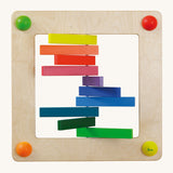 Erzi Sensory Rainbow Panel Wall Board. A fun, interactive wall board with 10 rotating rainbow blocks, on a cream background
