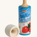Erzi Wooden Squirty Cream, with a removable wooden lid. On a cream background