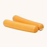Erzi Wooden Wiener Sausages. 2 Wooden Wiener sausages held together with white cord, on a cream background. The natural wood grain shows through the colour, giving a realistic look of sausages