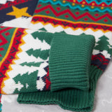 A close up of the green arm cuffs on the Frugi forest fairisle/yeti jumper available at Babipur.