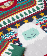 A close up of the cute playful yeti design on the Frugi forest fairisle/yeti jumper available at Babipur.