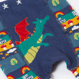 A close up of the Frugi little knitted leggings in dragon fair isle available at Babipur showing the dragon detail on the front