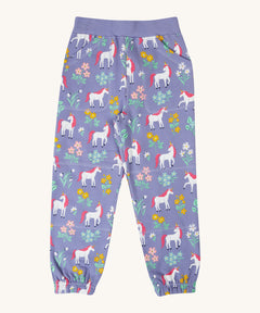 Frugi malpas joggers in unicorn / floral available at Babipur. A GOTS organic cotton jogger in light purple with a playful unicorn and floral design. Features elasticated cuffs and side pockets
