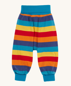 Frugi parsnip pants in big rainbow stripe available at Babipur. A GOTS organic cotton bottom in bold rainbow inspired striped design. Features blue elasticated cuffs
