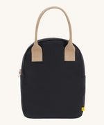 Fluf zip lunch bag in a solid black colour with a light brown handle on a cream background.