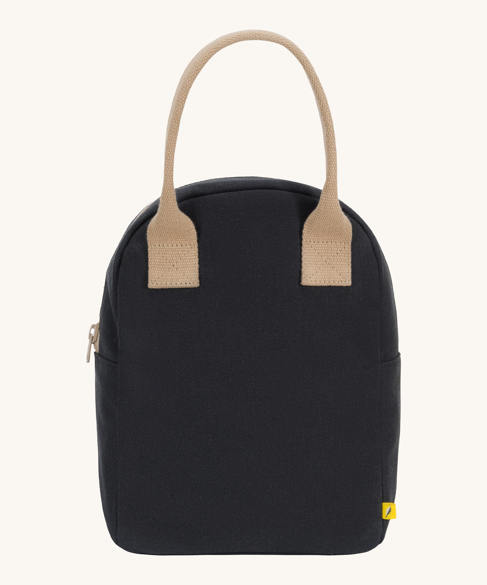 Fluf zip lunch bag in a solid black colour with a light brown handle on a cream background.