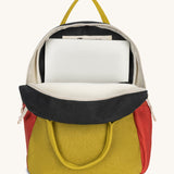 The organic cotton kids Fluf B-Pack Jr in carbon cactus, the backpack is unzipped and there's a small laptop inside.