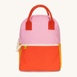 The organic cotton Fluf B-Pack Jr, a kids school backpack in a pink colourblock design.