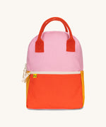 The organic cotton Fluf B-Pack Jr, a kids school backpack in a pink colourblock design.
