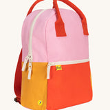 A side view of The organic cotton Fluf B-Pack Jr, a kids school backpack in a bright colour block design